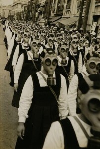 School-girls-in-horrifying-gas-masks.-WWII-202x300